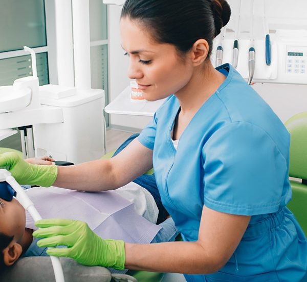 child-at-dentists-office-receiving-sedation-dentistry